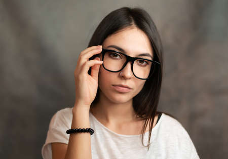 Portrait of woman wearing glasses. Selective focus.の写真素材