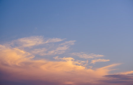 Dramatic sunset sky with colored clouds. Toned image.の写真素材