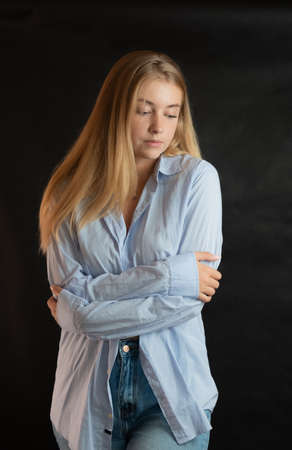 Portrait of beautiful sensual woman with blue eyes. Studio shot.の写真素材