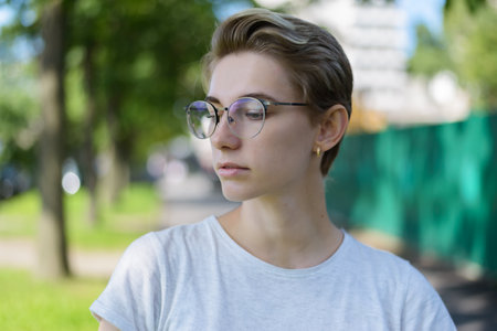 Portrait of beautiful young woman wearing glasses.の写真素材