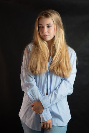 Portrait of beautiful sensual woman with blue eyes. Studio shot.の写真素材