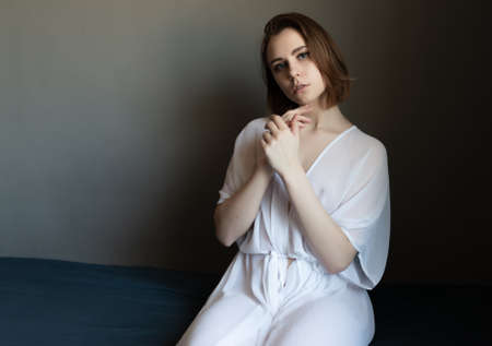 Portrait of a beautiful young woman with blue eyes.の写真素材