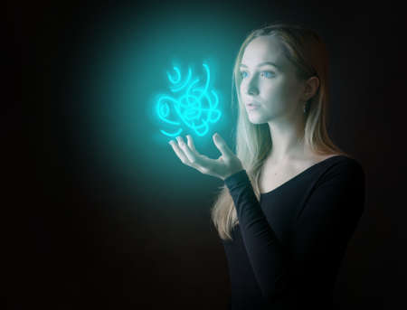 Magic light levitate over womans hand.の写真素材