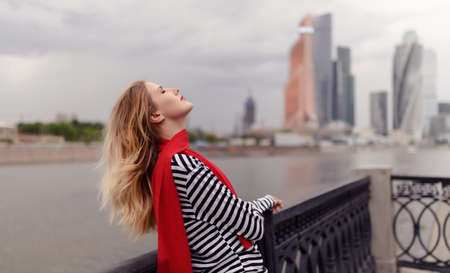 Outdoors portrait of beautiful young woman. Selective focus.の写真素材