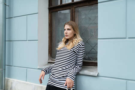 Street portrait of beautiful young woman.の写真素材