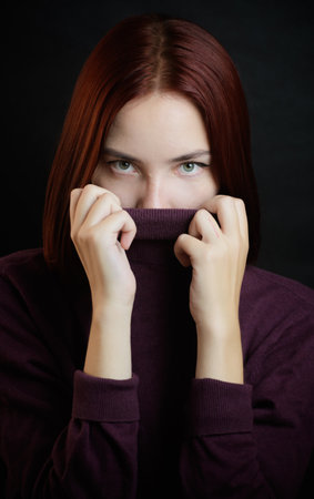 Portrait of a beautiful young woman. Selective focus.の写真素材