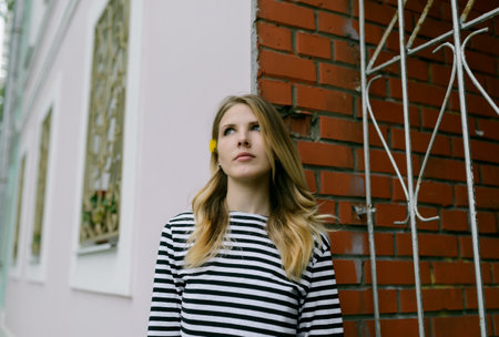 Portrait of beautiful young woman. She enjoys the sumertime.の写真素材