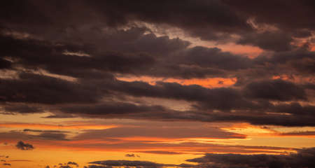 Beautiful colorful sky with clouds and sunlight. Color toned.の写真素材