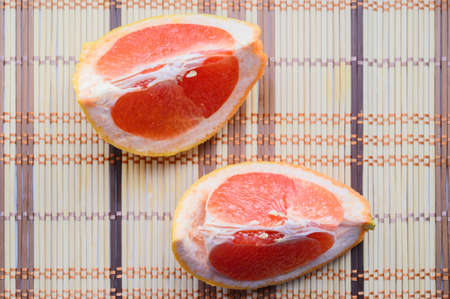 Half of fresh grapefruit. Selective focus.の写真素材