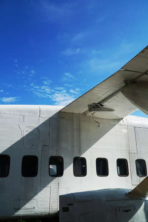 airplane with a bright cloud background