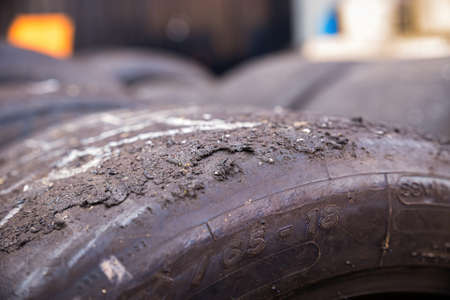 Change a flat car tire on road with Tire maintenance, damaged car tyre
