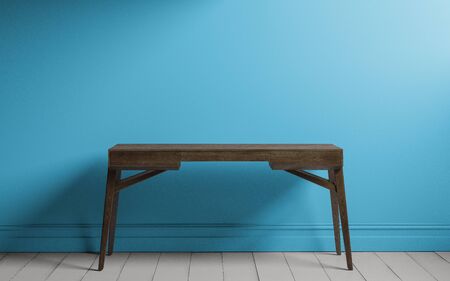Empty wooden table and blue colored wall background. For product displayの写真素材