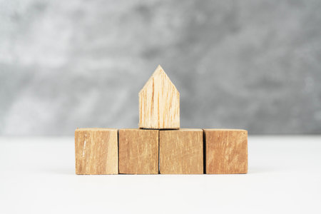 Wooden Blocks and House Construction Conceptの写真素材