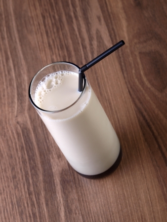 Horchata is a drink, made with the juice of tiger nuts and sugar   Native from Valencia  Spain, it is a refreshing drink, often accompanied with long thin buns called fartons の写真素材