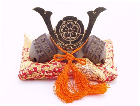 Japanese souvenir  Miniature of a samurai helmet on a pillow  
