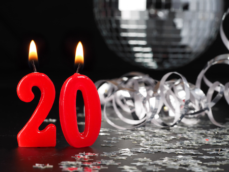 Red candles showing Nr. 20.   Abstract Background for birthday or anniversary party.の写真素材
