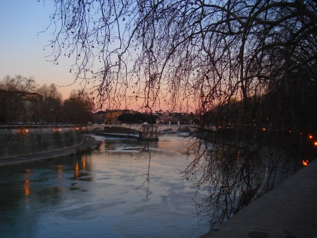 Pleasant promenade on the Tiber bank in the eveningの写真素材