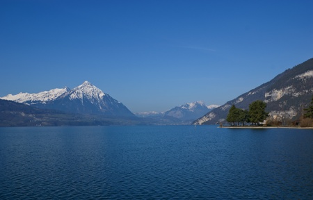 the view of one of the most beautiful lakes in switzerland, thunersee, interlakenの写真素材