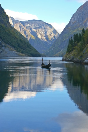 The lonely boat in the middle of the Sognefjord, Norwayの写真素材