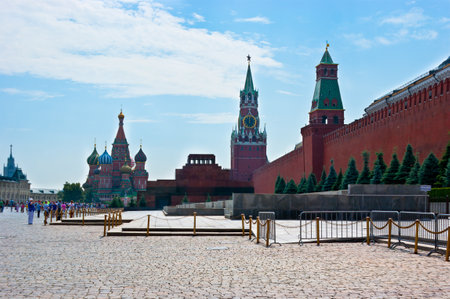 Moscow - June 28, 2013: The view on the Red Square with the Saint Basil's Cathedral, Lenin's Mausoleum,  Spasskaya Tower, Senatskaya Tower and Moscow Kremlin Wall.のeditorial素材