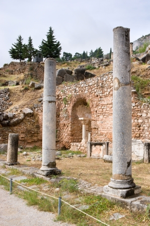 The antique columns are the part of the Spartan monument in Delphi, Greece.の写真素材