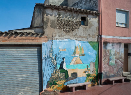BOSA, ITALY - SEPTEMBER 28, 2012 - The painting on the wall is the traditional sardinian home decoration and according to the old belief it protects the house against evil forces, on September 28 in Bosa.のeditorial素材
