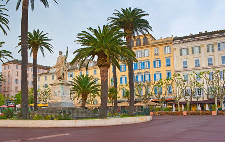 The monument to Napoleon Bonaparte on General de Gaulle Boulevard is surrounded by scenic flowerbed and palms, Bastia, Corsica, France.のeditorial素材