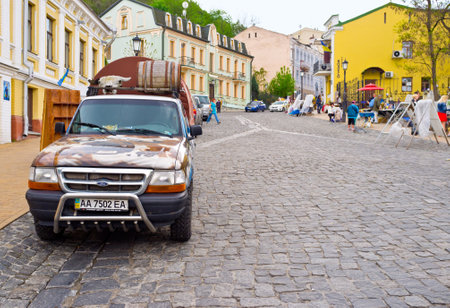 KIEV, UKRAINE - MAY 1, 2014: The Andrew's Descent is the major  tourist attraction, there are many souvenir shops and art galleries, on May 1 in Kiev.のeditorial素材