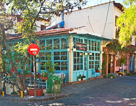 THESSALONIKI, GREECE - OCTOBER 17, 2013: The colorful street cafe, located in the old neighborhood, next to the city walls, on October 17 in Thessaloniki.のeditorial素材