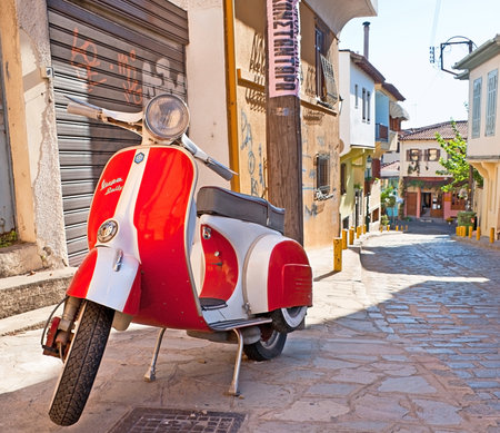 THESSALONIKI, GREECE - OCTOBER 17, 2013: The old-fashioned moped parked in the old city neighborhood, on October 17 in Thessaloniki.のeditorial素材