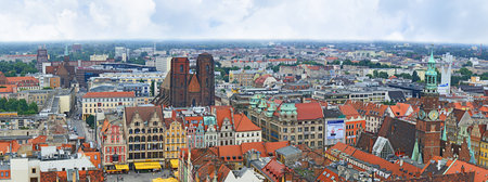 WROCLAW, POLAND - JULY 5, 2010: The aerial view from the bell tower of St Peter's Basilica on the tiled roofs, Old Town Hall and St Mary Magdalene Church, on July 5 in Wroclaw.のeditorial素材