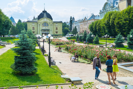 CHERNIVTSI, UKRAINE - JUNE 20, 2014: The  architecture ensemble of the Theatre Square with the scenic garden in the middle, on June 20, 2014.のeditorial素材
