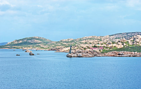 LA MADDALENA, SARDINIA - SEPTEMBER 25, 2012: The Isolotto Roma with the memorial column for the deads of Battleship Roma, on September 25 in La Maddalenaのeditorial素材