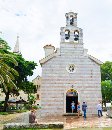 BUDVA, MONTENEGRO - JULY 12, 2014: The Holy Trinity Church is always full of tourists and pilgrims, on July 12 in Budva.のeditorial素材