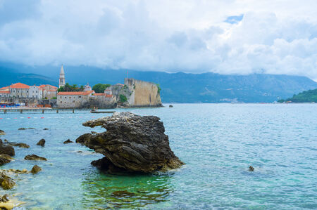 Budva boasts the Venetian citadel for sightseeing, perfect beaches for relax, rocky coastline and foggy mountains for the romantic views, Montenegro.の写真素材