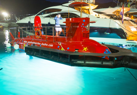 BUDVA, MONTENEGRO - JULY 12, 2014: The glass-bottom submarine demonstrates its powerfull lights for the night discovery of the seabed, on July 12 in Budva.のeditorial素材