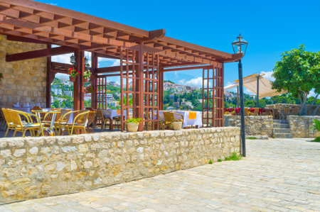 The numerous luxury outdoor restaurants and cozy cafes located at the Kalaja fortress, Ulcinj, Montenegro.のeditorial素材