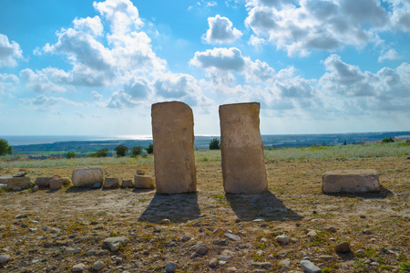 The old columns with the scenic landscape of the Paphos coast, Cyprus.の写真素材