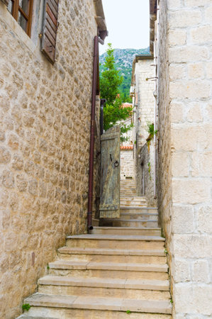 The old town located at the foot of the mountain, so there are many narrow streets with the old staircases, going up, Perast, Montenegro.のeditorial素材