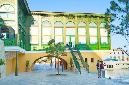 LIMASSOL, CYPRUS - AUGUST 6, 2014: The luxury restaurant of the local cuisine with great view on the modern port, on August 6, 2014.のeditorial素材