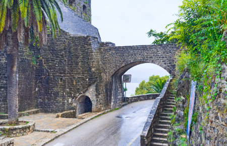 The old stone bridge connects to parts of the medieval citadel in Herceg Novi, Montenegro.のeditorial素材