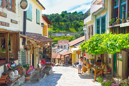 STARI BAR, MONTENEGRO - JULY 14, 2014: The narrow tourist street with the souvenir market, numerous cafes and restaurants, on July 14 in Stari Bar.のeditorial素材
