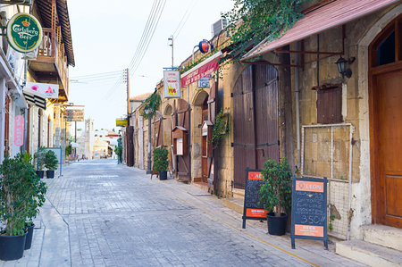 POLIS, CYPRUS - AUGUST 3, 2014: The tiny streets of town are full of cozy cafes, souvenir shops and old villas, on August 3 in Polis.のeditorial素材