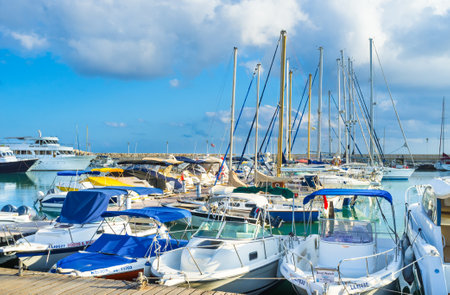 LATCHI, CYPRUS - AUGUST 3, 2014: The fishing boats and tourist yachts in port, on August 3 in Latchi.のeditorial素材