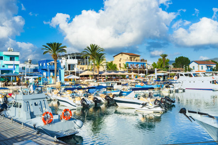 The harbor of Latchi village with the numerous cafes and bars at the central promenade, Cyprus.のeditorial素材
