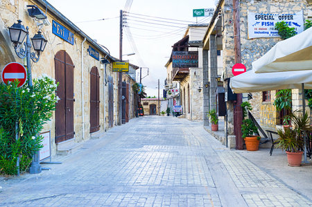 POLIS, CYPRUS - AUGUST 3, 2014: Griva Digeni is the central street with many tourist shops and cafes, on August 3 in Polis.のeditorial素材