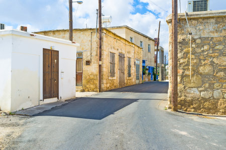 The narrow street with the medieval houses in Neo Chorio village, Cyprus.のeditorial素材