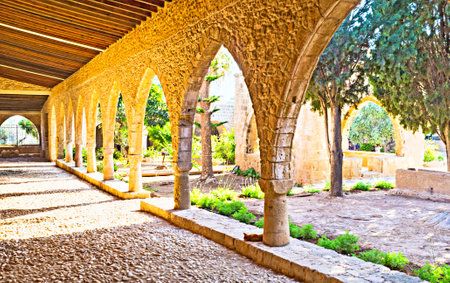 AYIA NAPA, CYPRUS - AUGUST 1, 2014: The shady gallery of Ayia Napa monastery, that is the most notable landmark of resort, on August 1 in Ayia Napa.のeditorial素材