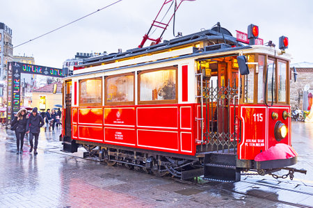 ISTANBUL, TURKEY - JANUARY 12, 2015: The old red tram on the Taksim-Tunel Nostalgia Tramway, on January 12 in Istanbul.のeditorial素材