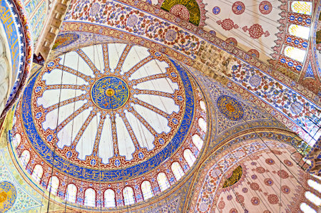 ISTANBUL, TURKEY - JANUARY 13, 2015: The dome of the  Blue Mosque decorated with colorful traceries and ancient arabic calligraphy, on January 13 in Istanbul.のeditorial素材